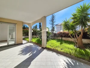 Quadrilocale con giardino e posto auto